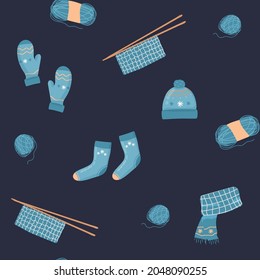 vector seamless pattern. cartoon Knitted items. Cute, warm winter clothes backdrop. Skein of wool, knitting needles, scarf, socks, gloves scarf
