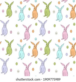 Vector seamless pattern of cartoon multi-colored Easter bunnies and eggs on a white background. Print for Easter paper, fabric.