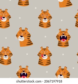 Vector seamless pattern with cartoon muzzles tigers and stars on a grey background. Funny animals for New Year's design. Background for gift wrapping or fabric design.