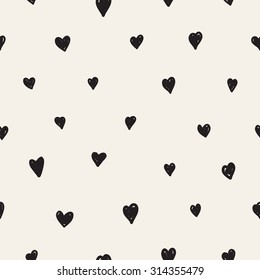 Vector seamless pattern. Casual polka dot texture. Stylish print with hand drawn hearts.