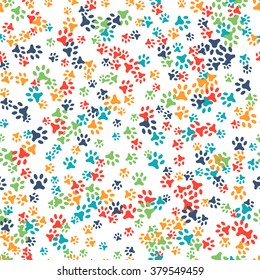 Vector seamless pattern with cat or dog footprints. Can be used for wallpaper, web page background, surface textures. Add your text. Cute colorful paws. Animal concept. Foot steps. Veterinary. Vector