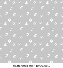 Vector seamless pattern with cat or dog,kitten or puppy footprints. Can be used for wallpaper,fabric, web page background, surface textures.