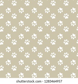 Vector seamless pattern with cat or dog,kitten or puppy footprints. Can be used for wallpaper,fabric, web page background, surface textures.