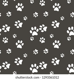 Vector seamless pattern with cat or dog,kitten or puppy footprints. Can be used for wallpaper,fabric, web page background, surface textures.