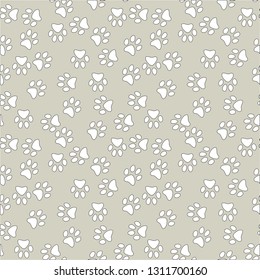 Vector seamless pattern with cat or dog,kitten or puppy footprints. Can be used for wallpaper,fabric, web page background, surface textures.