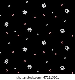 vector seamless pattern cat paw print and circles on a black background. for widespread use. abstract background, animal footprint, vector illustration.