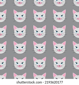 Vector seamless pattern with a cat's head on a gray background