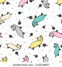 Vector seamless pattern with cats and ravels . Simple hand drawn background with doodle kittens. Pastel colors.