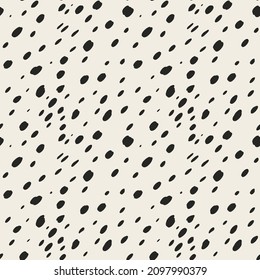 Vector seamless pattern. Chaotic background with irregular dots, specks, circles.