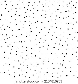 Vector seamless pattern with chaotic scattered confetti. Monochrome noisy texture. Hand drawn black uneven specks, spots, blobs. Grainy surface distress vector background. Grunge design with dots