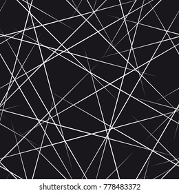 Vector seamless pattern from chaotically scattered straight lines. Regular abstract striped texture.