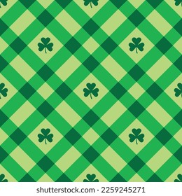 Vector seamless pattern of checkered texture with shamrock trefoil isolated on green background