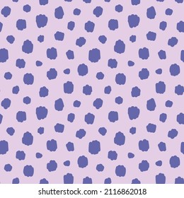 Vector seamless pattern of cheetah, guepard skin. The trending color of 2022 is very peri. Safari style. Abstract background