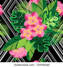 Vector seamless pattern. Chic bouquets of exotic tropical leaves and flowers on a gray and black background of rhombuses