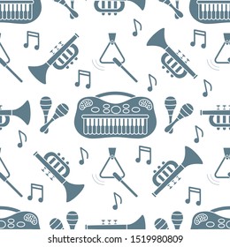 Vector seamless pattern with children's musical toys. Illustration with musical instruments. Maracas, synthesizer, trumpet, triangle and notes. Toys for kids. Design for packaging paper, fabric, print
