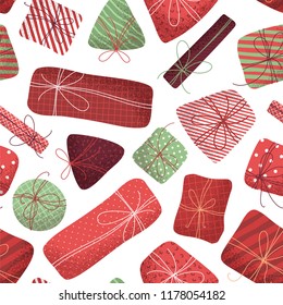 Vector seamless pattern of Christmas gifts. Various red and green flat presents with grain texture on white background. Hand-drawn tileable illustration.
