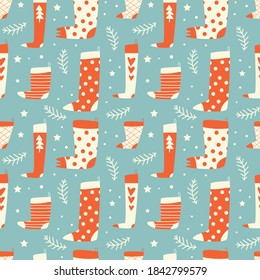 Vector seamless pattern with Christmas illustrations. Funny christmas socks. Vector illustration for wrapping paper, textile, decorations.
