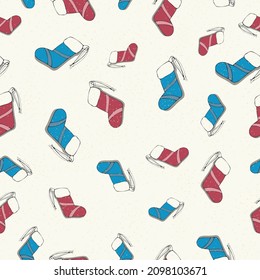 Vector Seamless pattern with christmas socks. Christmas or New year background.