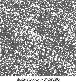 Vector seamless pattern. Christmas texture with snowfall. Chaotic speckled backdrop. Graphical speckled background.