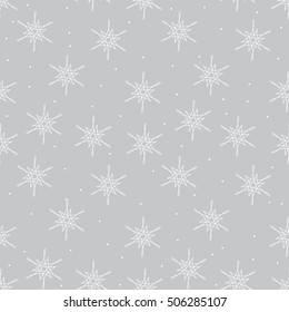 Vector seamless pattern. Christmas texture with cute tiny snowflakes Holiday graphic design. Modern hipster background.