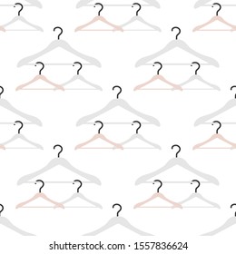 Vector seamless pattern with clothes hangers. Dry cleaning and laundry service. Black friday, big sale, discount. Organization of storage in a wardrobe. Design for packaging paper, fabric, print.