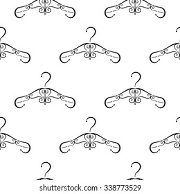 Vector seamless pattern with clothes hangers