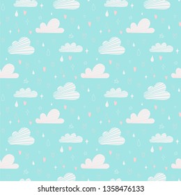 Vector seamless pattern with clouds, stars and drops of rain on a light blue background