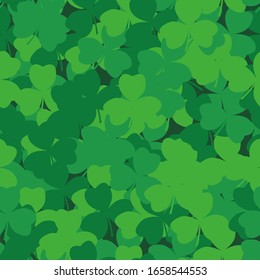 Vector of seamless pattern with clover leaves. St. Patrick`s day background