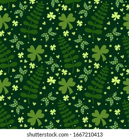 Vector seamless pattern with clover leaves on a green background. Suitable for St. Patrick's Day or spring design. For the design of fabric, wrapping paper, wallpaper.
