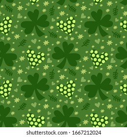 Vector seamless pattern with clover leaves on a green background. Suitable for St. Patrick's Day or spring design. For the design of fabric, wrapping paper, wallpaper.