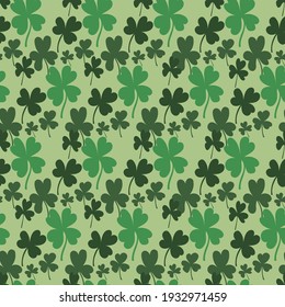 Vector of seamless pattern with clovers leaves on light green background.St.Patrick`s day design