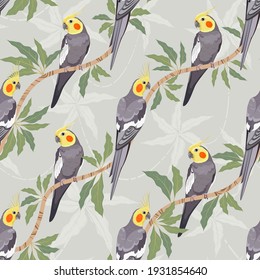 Vector seamless pattern with Cockatiel parrots on the branches with leaves