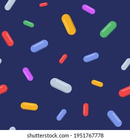 Vector seamless pattern with color pills, tablets, isolated on dark blue background. Medical preparations. Flat design. Color illustration.