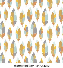 Vector seamless pattern with colored abstract feathers on white background. 