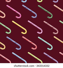 Vector seamless pattern with colored Christmas candy cane isolated on burgundy background
