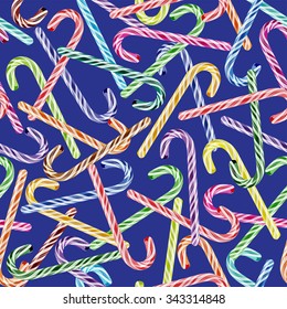 Vector seamless pattern with colored Christmas candy cane isolated on blue background