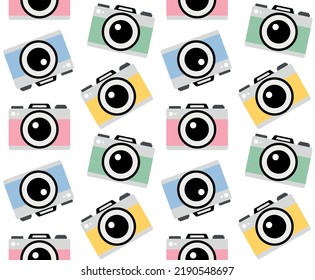 Vector seamless pattern of colored flat photo camera isolated on white background