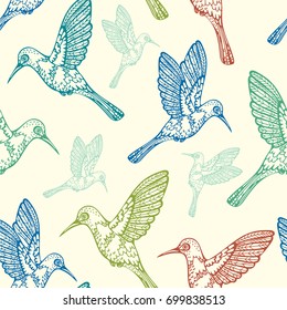 Vector seamless pattern - colored hummingbirds on a yellow background. 