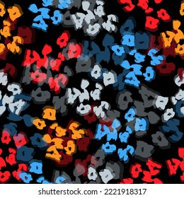 Vector seamless pattern with colored leopard print. Animal print. Cheetah print. Colored safari background.