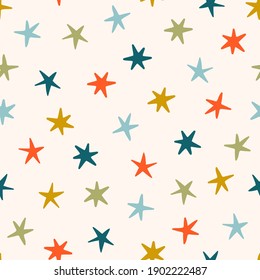 Vector seamless pattern with colored stars. Simple repeated texture with falling stars. Childish print for kids fabric and wrapping paper. Scandinavian style.