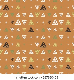 Vector seamless pattern of colored triangles drawn by hand