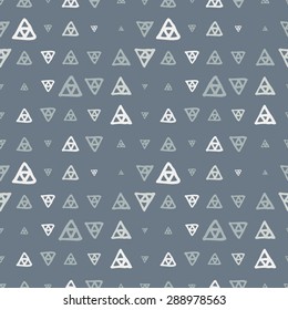 Vector seamless pattern of colored triangles drawn by hand