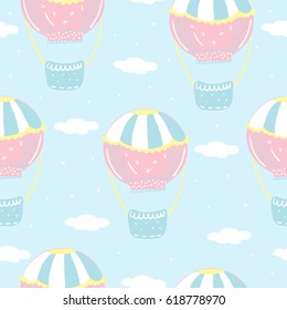Vector seamless pattern with colorful air balloon in the sky.