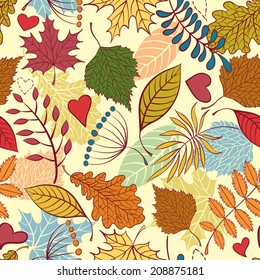 Vector seamless pattern with colorful autumn leaves and hearts 