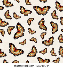 Vector seamless pattern of colorful butterflies over a bright background