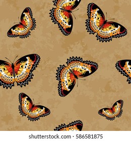 Vector seamless pattern of colorful butterflies over a grunge background