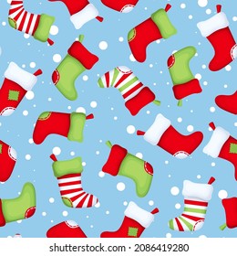 Vector seamless pattern with colorful Christmas socks on a blue background.