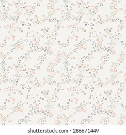 Vector seamless pattern of colorful crooked rings