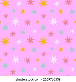 Vector seamless pattern with colorful cute retro stars on pink background. Abstract glitter trendy wallpaper for kids, retro design and 1970s party.