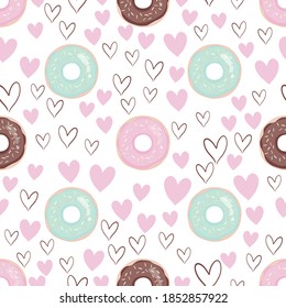 Vector seamless pattern with colorful donuts with glaze and sprinkles on a white background.